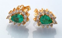 Lot 735 - A pair of emerald and diamond cluster earrings,...