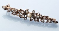 Lot 740 - A Victorian diamond and pearl set floral...