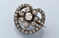 Lot 741 - A Victorian diamond set flower pattern brooch,...