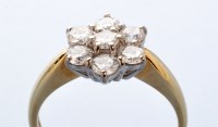 Lot 747 - A diamond cluster ring, the seven brilliant...