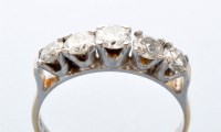 Lot 748 - A five stone diamond ring, the graduated...