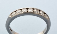 Lot 753 - A seven stone diamond ring, the seven...