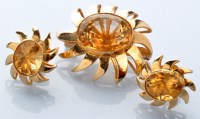 Lot 792 - A citrine brooch and matching pair of earrings,...