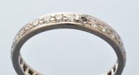 Lot 802 - A diamond eternity ring, the eight-cut...