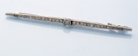 Lot 806 - A diamond bar brooch, the old and senaille cut...