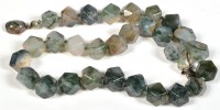 Lot 813 - A 20th Century moss agate necklace, the...