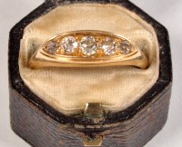 Lot 818 - A five stone diamond ring, the graduated old...