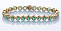 Lot 819 - An emerald bracelet, each of the twenty seven...