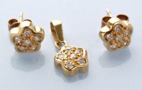 Lot 838 - A pair of star-shaped diamond set earrings and...