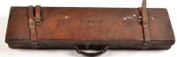 Lot 957 - An early 20th Century leather-on-wood shotgun...