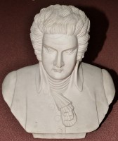 Lot 1037 - Artist Unknown: a carved marble bust figure of...