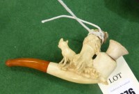 Lot 1076 - A Victorian carved meerschaum pipe in the form...