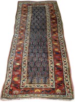 Lot 1106 - A Kuba runner, with stylized tree forms to...