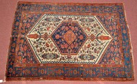 Lot 1108 - A Kurdish rug, the central medallion decorated...