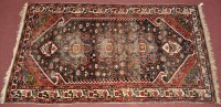 Lot 1109 - A Bakhtiari rug, the central field decorated...