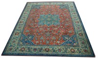 Lot 1113 - A Tabriz carpet, the central blue floral...