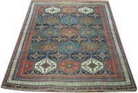 Lot 1115 - An Afshar rug, the field with hexagonal cell...