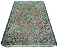 Lot 1120 - A Kashan rug, the central diamond shaped...