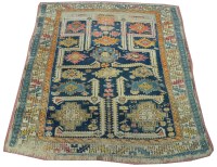 Lot 1124 - A Caucasian Kuba rug, the central field with...