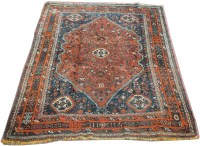 Lot 1125 - A Qashqai carpet, the central field decorated...