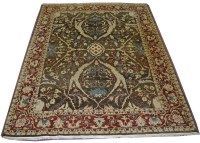 Lot 1127 - A Zegla style rug, with full scrolling floral...