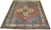 Lot 1128 - A Heriz carpet, the geometric medallion...