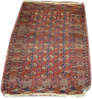 Lot 1130 - An antique Turkoman rug, decorated with 3 x 10...