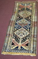 Lot 1131 - A North West Persian runner, decorated with...