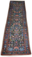 Lot 1132 - A Hamadan runner, decorated with geometric...