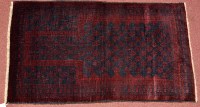 Lot 1137 - A Beluch prayer rug, decorated with leaf...