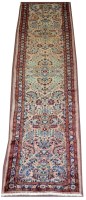 Lot 1142 - A Persian Kashmar runner, the fields decorated...