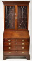 Lot 1172 - A George III mahogany bureau bookcase, the...