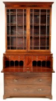 Lot 1180 - A late George III mahogany secretaire bookcase,...