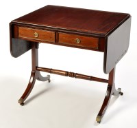 Lot 1185 - A mahogany sofa table, the rectangular top and...