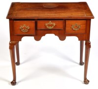 Lot 1189 - A George III mahogany lowboy, the rectangular...