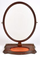 Lot 1196 - A 19th Century mahogany toilet mirror, the...