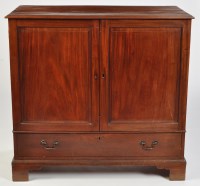 Lot 1199 - An early 19th Century mahogany press cupboard,...