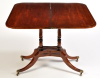 Lot 1210 - A late Regency mahogany turnover top tea table,...
