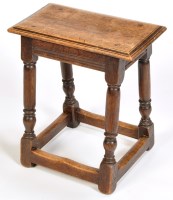 Lot 1218 - A 17th Century style oak stool, the moulded...