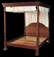 Lot 1232 - A 20th Century stained hard wood four poster...