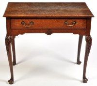 Lot 1247 - An 18th Century and later oak lowboy, the...