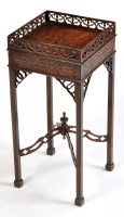 Lot 1248 - An early 20th Century mahogany urn stand, the...