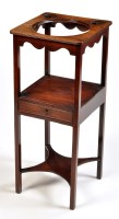 Lot 1253 - A George III mahogany pedestal washstand, the...