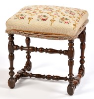 Lot 1254 - A Jacobean style oak stool, the woolwork...