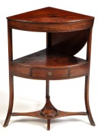 Lot 1256 - A George III mahogany bowfront corner...