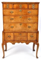 Lot 1261 - A George II and later walnut chest on stand,...