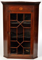 Lot 1262 - A George III style mahogany hanging corner...