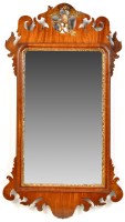 Lot 1267 - A George III mahogany parcel gilt wall mirror,...