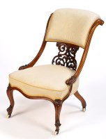 Lot 1271 - A Victorian walnut easy chair, the upholstered...