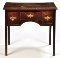 Lot 1282 - A mid 18th Century lowboy, the rectangular elm...